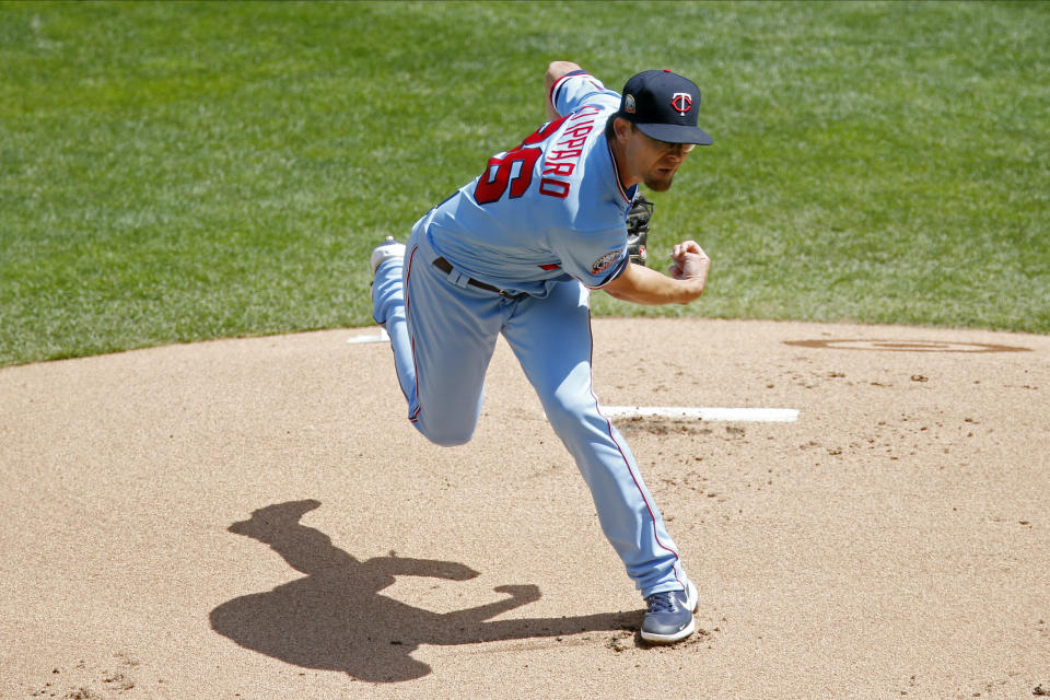 Minnesota Twins pitcher Tyler Clippard throws against the Cleveland Indians in the first inning of a baseball game Sunday, Aug. 2, 2020, in Minneapolis. (AP Photo/Jim Mone)