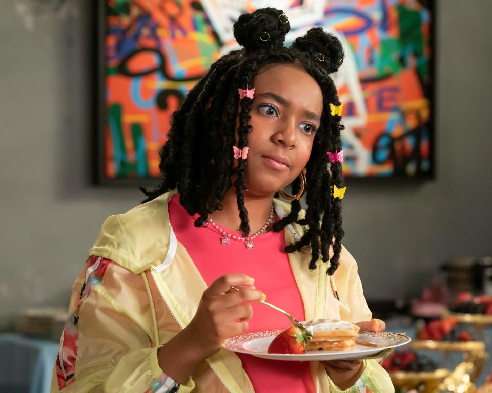 Peyton Basnight wearing butterfly locs on the set of "Saturdays," a Disney Channel show that premiered in March 2023.
