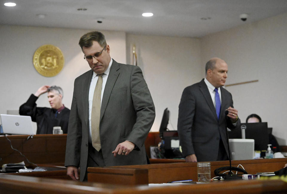 Washington County First Assistant District Attorney Christian P. Morris, center, and defense attorney Arthur Frost, right, return to their seats after approaching Washington County Judge Adam Michelini, left, during opening statements in Kevin Monahan's murder trial, Thursday, Jan. 11, 2024, at the Washington County Courthouse in Fort Edward, N.Y. Monahan, 66, is accused of fatally shooting 20-year-old Kaylin Gillis on the night of April 15, 2023, after she and friends accidentally pulled into his driveway in rural Hebron. He is charged with second-degree murder, reckless endangerment and tampering with physical evidence. (Will Waldron/The Albany Times Union via AP, Pool)