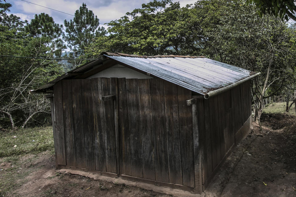 The one room home of a young woman who said she went through her abortion here alone the previous year by taking abortion pills, stands in an unidentified mountains area of western Honduras, Sunday, March 19, 2023. With a cellphone as her only companion for chats with a friend and an anonymous guide, the then 27-year-old became one of the women who are terminating pregnancies across the country with the help of clandestine networks. (AP Photo/Ginnette Riquelme)