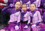 Ice girls, Kang Hae-bin (L-R), Youn Seo-jin and Oh Yu-jin pose at Gangneung Ice Arena during the Pyeongchang 2018 Winter Olympics in Pyeongchang, South Korea, February 20, 2018.