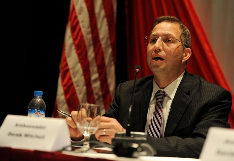 US Ambassador to Myanmar, Derek Mitchell, pictured during a press conference in Yangon, on August 15, 2012. Mitchell has said he is 'deeply concerned' about civilian deaths in a recent attack on a rebel stronghold in the country's north during the escalation of a bitter civil war