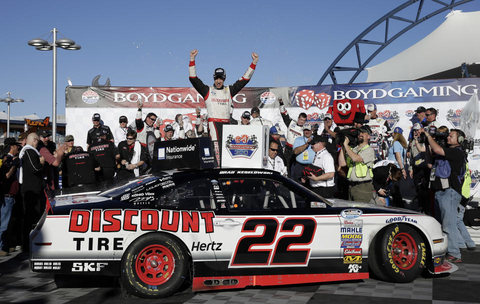 Brad Keselowski celebrates in Victory Lane after winning the NASCAR Nationwide Series auto race Saturday, March 8, 2014, in Las Vegas. (AP Photo/Isaac Brekken)