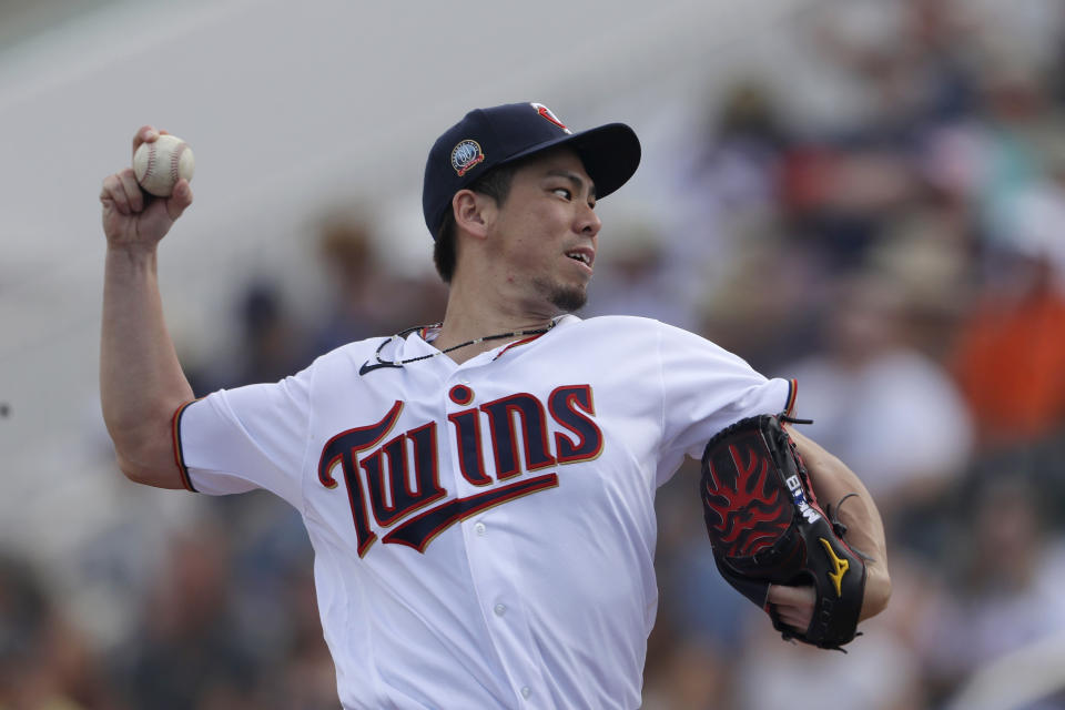 Minnesota Twins starting pitcher Kenta Maeda works in the first inning of a spring training baseball game against the Boston Red Sox Monday, Feb. 24, 2020, in Fort Myers, Fla. (AP Photo/John Bazemore)