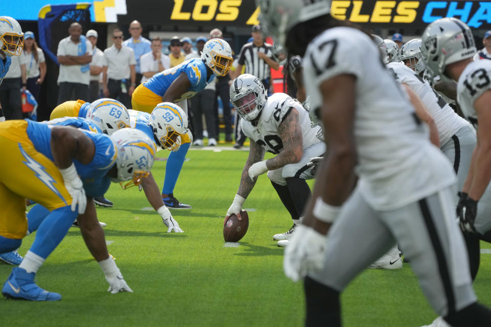 Sep 11, 2022; Inglewood, California, USA; Las Vegas Raiders center Andre James (68) snaps the ball against the Los Angeles Chargers in the second half at SoFi Stadium. Mandatory Credit: Kirby Lee-USA TODAY Sports