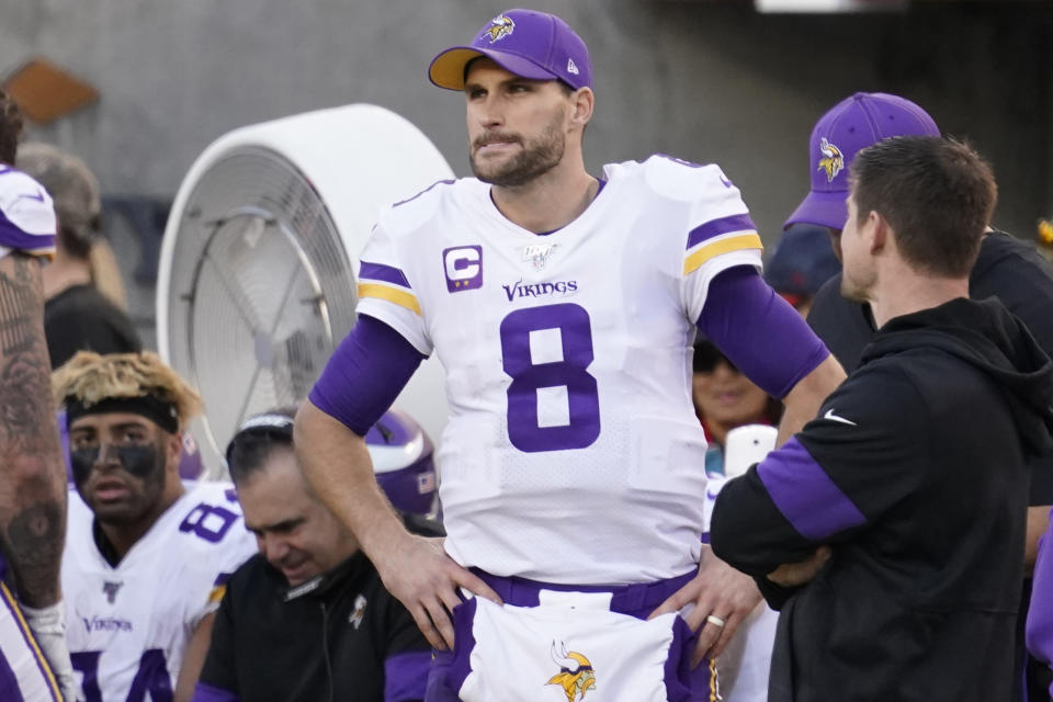 Minnesota Vikings quarterback Kirk Cousins (8) stands on the sideline during the second half of an NFL divisional playoff football game against the San Francisco 49ers, Saturday, Jan. 11, 2020, in Santa Clara, Calif. (AP Photo/Tony Avelar)