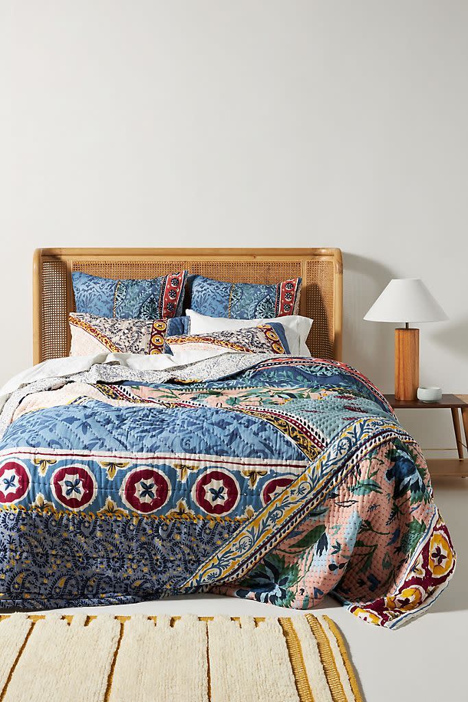 <p><strong>Artisan Quilts by Anthropologie</strong></p><p>anthropologie.com</p><p><strong>$248.00</strong></p><p><a href="https://go.redirectingat.com?id=74968X1596630&url=https%3A%2F%2Fwww.anthropologie.com%2Fshop%2Fkantha-stitched-katya-quilt&sref=https%3A%2F%2Fwww.townandcountrymag.com%2Fleisure%2Fg37191699%2Ffall-bedroom-decor%2F" rel="nofollow noopener" target="_blank" data-ylk="slk:Shop Now;elm:context_link;itc:0;sec:content-canvas" class="link ">Shop Now</a></p><p>If you’re not ready to completely give up that summer-quilt feeling, try swapping yours for one with a more seasonal color palette. This one from Anthropologie offers a <a href="https://www.elledecor.com/design-decorate/room-ideas/g10241076/bohemian-room-decor/" rel="nofollow noopener" target="_blank" data-ylk="slk:boho print;elm:context_link;itc:0;sec:content-canvas" class="link ">boho print</a> in vibrant fall hues. </p>