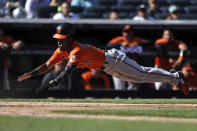 Baltimore Orioles' Cedric Mullins dives home to score a run against the New York Yankees during the seventh inning of a baseball game on Saturday, Sept. 4, 2021, in New York. (AP Photo/Adam Hunger)
