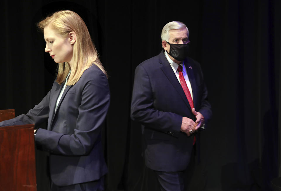 FILE - In this Oct. 9, 2020, file photo, Missouri gubernatorial candidates, Gov. Mike Parson, and State Auditor Nicole Galloway are seen onstage before the Missouri gubernatorial debate at the Missouri Theatre in Columbia, Missouri. They are opposing each other in the Nov. 3, 2020, general election. (Robert Cohen/St. Louis Post-Dispatch via AP, Pool, File)
