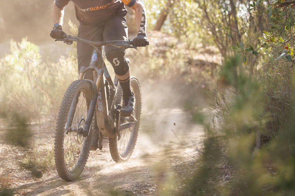 2024 Scott Voltage eRide lightweight TQ-powered carbon eMTB all-mountain ebike, photo by Daniel Geiger, dusty turn