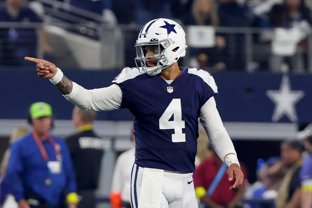 ARLINGTON, TEXAS - NOVEMBER 24: Dak Prescott #4 of the Dallas Cowboys reacts after a first down during the first half in the game against the New York Giants at AT&T Stadium on November 24, 2022 in Arlington, Texas. (Photo by Richard Rodriguez/Getty Images)