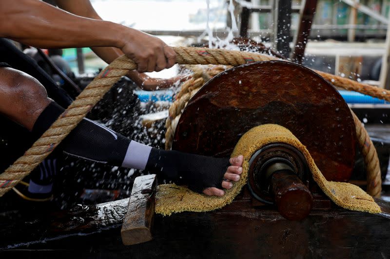 The Wider Image: Mining tin from the sea