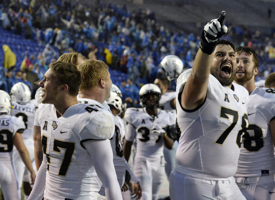 Central Florida defensive back Jonathan Gebka (L) and offensive lineman Wyatt Miller (R) celebrate after the team’s win against Memphis on Saturday, Oct. 13, 2018, in Memphis, Tenn. (AP Photo/Mark Zaleski)