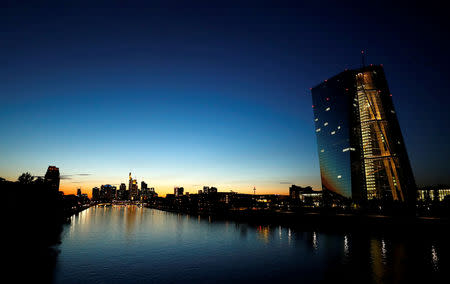 FILE PHOTO: The headquarters of the European Central Bank (ECB) and the skyline with its financial district are seen in the early evening in Frankfurt, Germany, September 30, 2018. REUTERS/Kai Pfaffenbach/File Photo