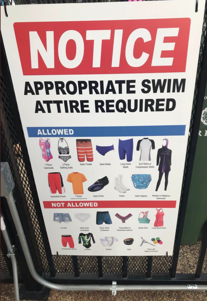 A sign posted by the homeowners association at Yamout's neighborhood pool explicitly includes a picture of a burkini as permitted swim attire. (Photo: Photo provided by Ala Yamout.)