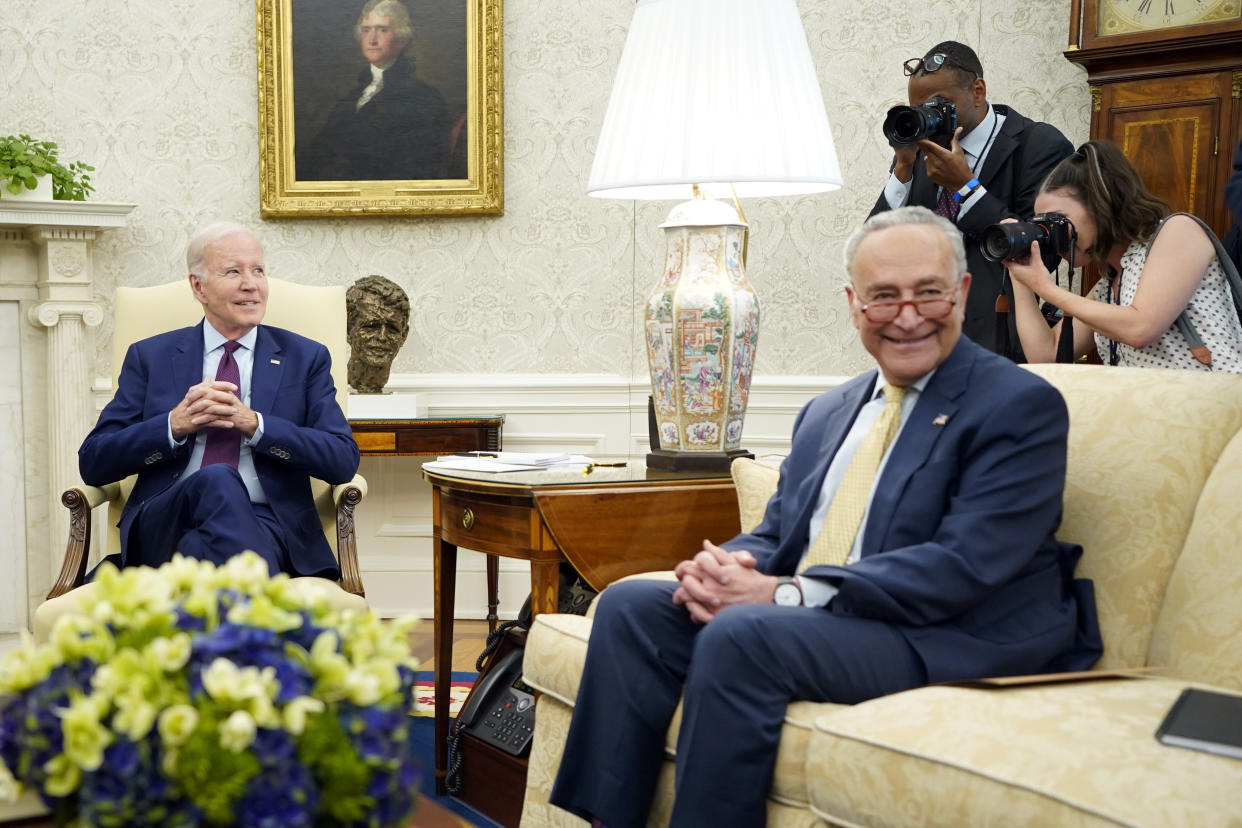 President Joe Biden and Senate Majority Leader Chuck Schumer of N.Y., meeting Sith Congressional leaders in the Oval Office of the White House, Tuesday, May 16, 2023, in Washington. (AP Photo/Evan Vucci)