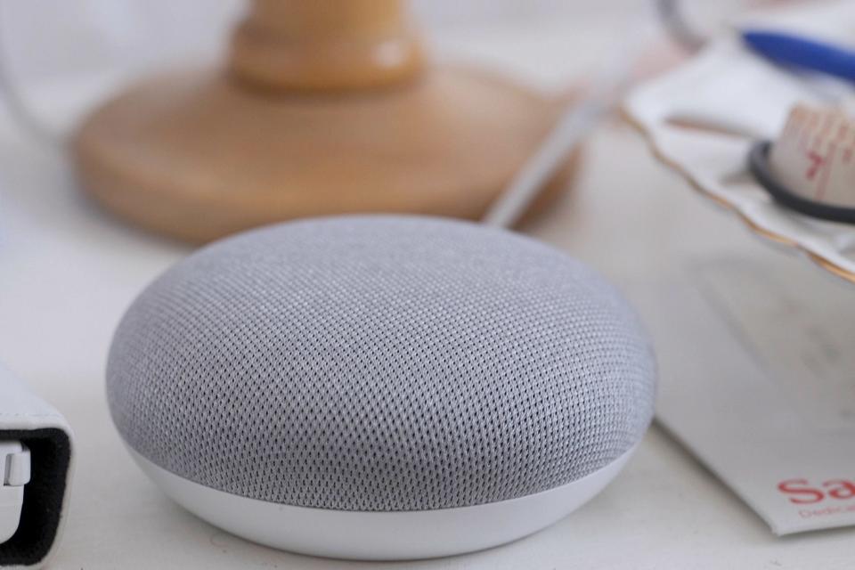 The Google Assistant can be found in products like the Google Home Mini (pictured here) (PA)