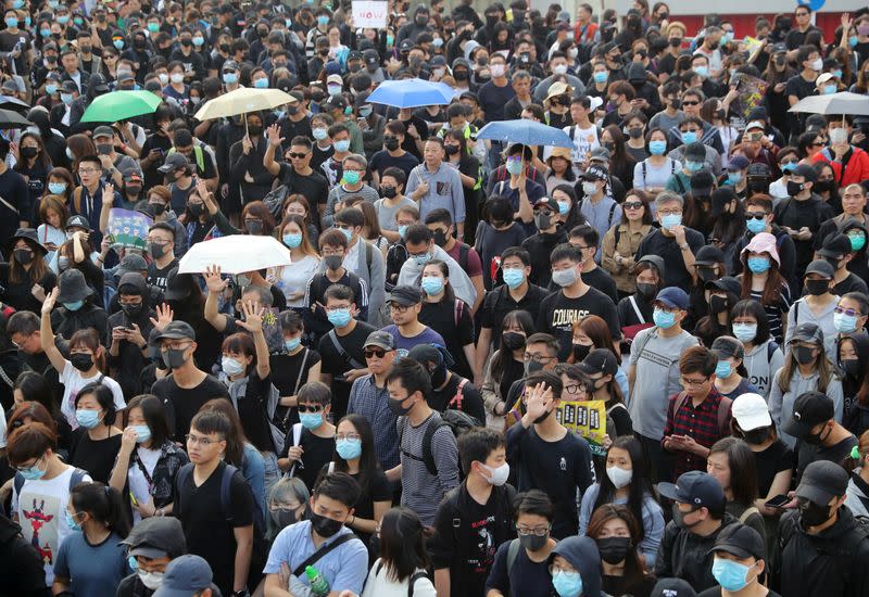 Anti-government protesters attend the "Lest We Forget" rally in Hong Kong