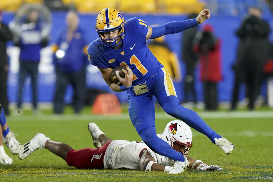 Pittsburgh quarterback Christian Veilleux (11) carries during the second half of the team's NCAA college football game against Louisville in Pittsburgh, Saturday, Oct. 14, 2023. (AP Photo/Matt Freed)