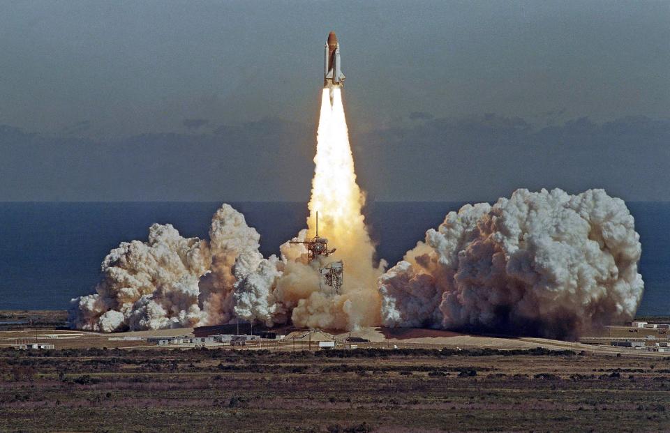 In this Jan. 28, 1986 picture, the space shuttle Challenger lifts off from the Kennedy Space Center in Cape Canaveral, Fla. shortly before it exploded with a crew of seven aboard.