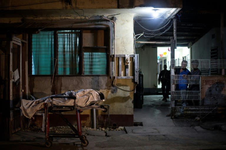 The body of one of four suspected Maute members, who were killed by unidentified gunmen in a June ambush on the police convoy they were being transported in, is seen on a stretcher at a hospital in Iligan on the southern island of Mindanao