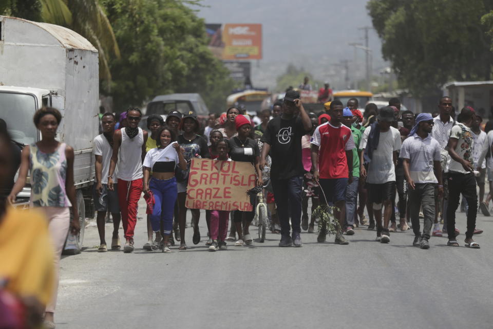 People march to demand the freedom of New Hampshire nurse Alix Dorsainvil and her daughter, who have been reported kidnapped, in the Cite Soleil neighborhood of Port-au-Prince, Haiti, Monday, July 31, 2023. Dorsainvil works for the El Roi Haiti nonprofit organization, and the U.S. State Department issued a "do not travel advisory" ordering nonemergency personnel to leave the Caribbean nation amid growing security concerns. (AP Photo/Odelyn Joseph)