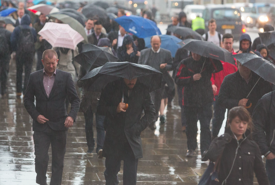 <em>The weather brings a dramatic end to the autumnal sunshine (Rex)</em>