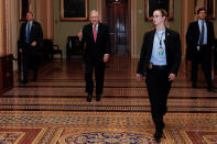 U.S. Senate Majority Leader McConnell enters the Senate Chamber Floor after Congress agreed to a multi-trillion dollar economic stimulus package created in response to the economic fallout from the COVID-19 Coronavirus, on Capitol Hill in Washington