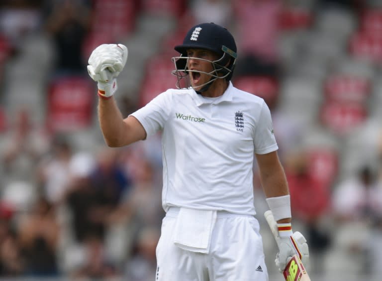 England's Joe Root celebrates reaching 200 on the second day of the second Test against Pakistan at Old Trafford on July 23, 2016