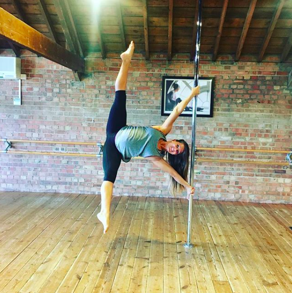 Charlotte Robertson is still pole dancing at 7 months pregnant [Photo: Instagram/Charlottepolefit]