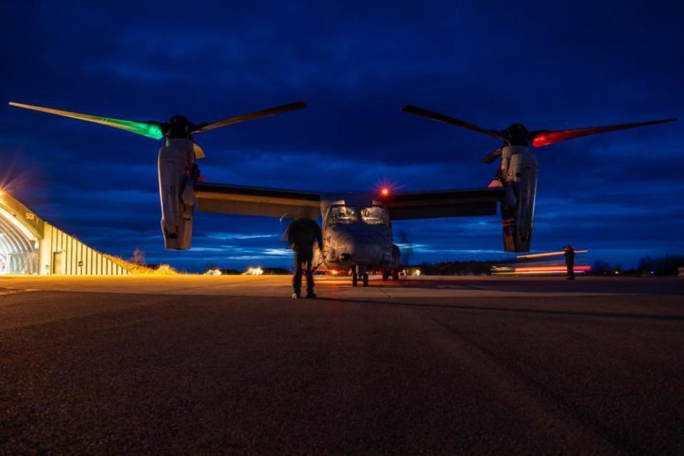 U.S. Marines inspect a MV-22B Osprey prior to flight at Norwegian Air Force Base Bodo during Exercise Cold Response 22, Norway, March 16, 2022.  / Credit: Lance Cpl. Elias E. Pimentel III / AP