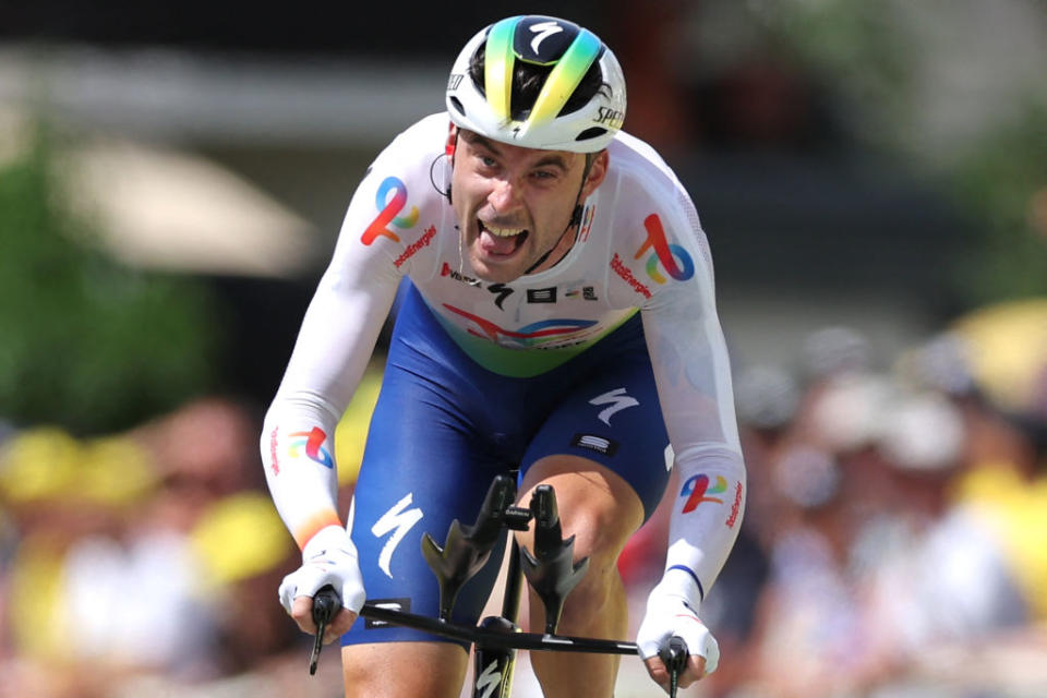 TotalEnergies' French rider Pierre Latour cycles to the finish line during the 16th stage of the 110th edition of the Tour de France cycling race, 22 km individual time trial between Passy and Combloux, in the French Alps, on July 18, 2023. (Photo by Thomas SAMSON / AFP)