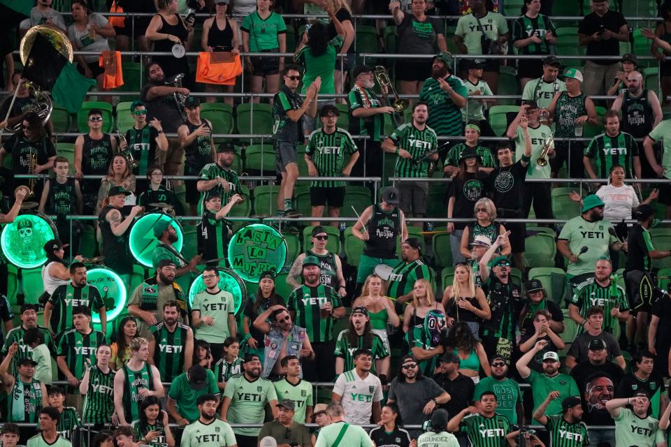 Austin FC fans show their support during the second half. Club officials announced Wednesday night's 2-1 win over Minnesota United FC as a sellout though there were empty seats sprinkled throughout Q2 Stadium.