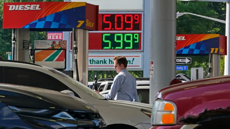 A man pumps gas at a mini-mart in Pittsburgh on June 15, 2022.