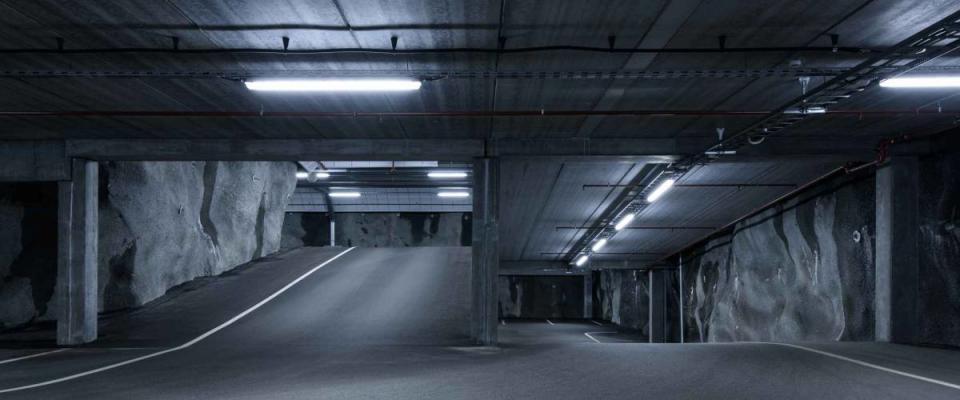 Dark and moody underground parking garage