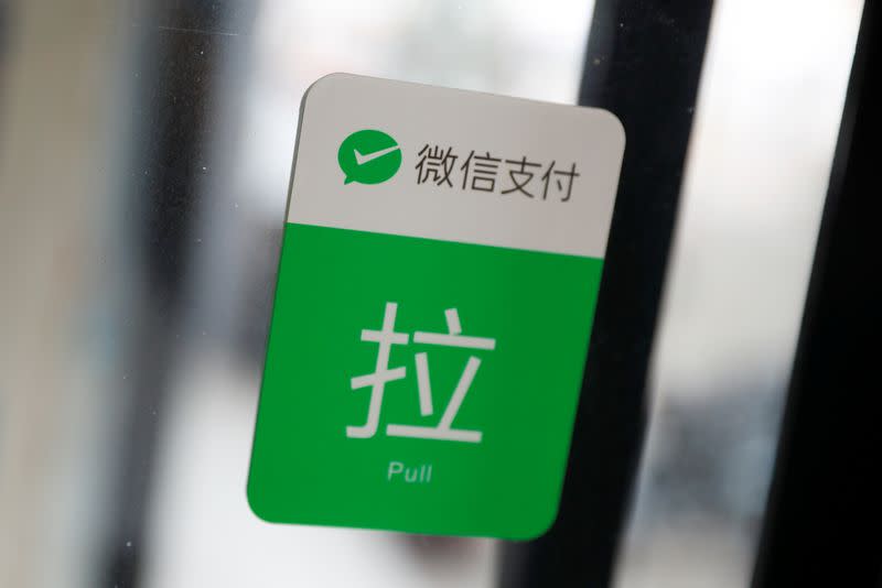 The logo of the digital payment service WeChat Pay is seen at a shop, in Beijing