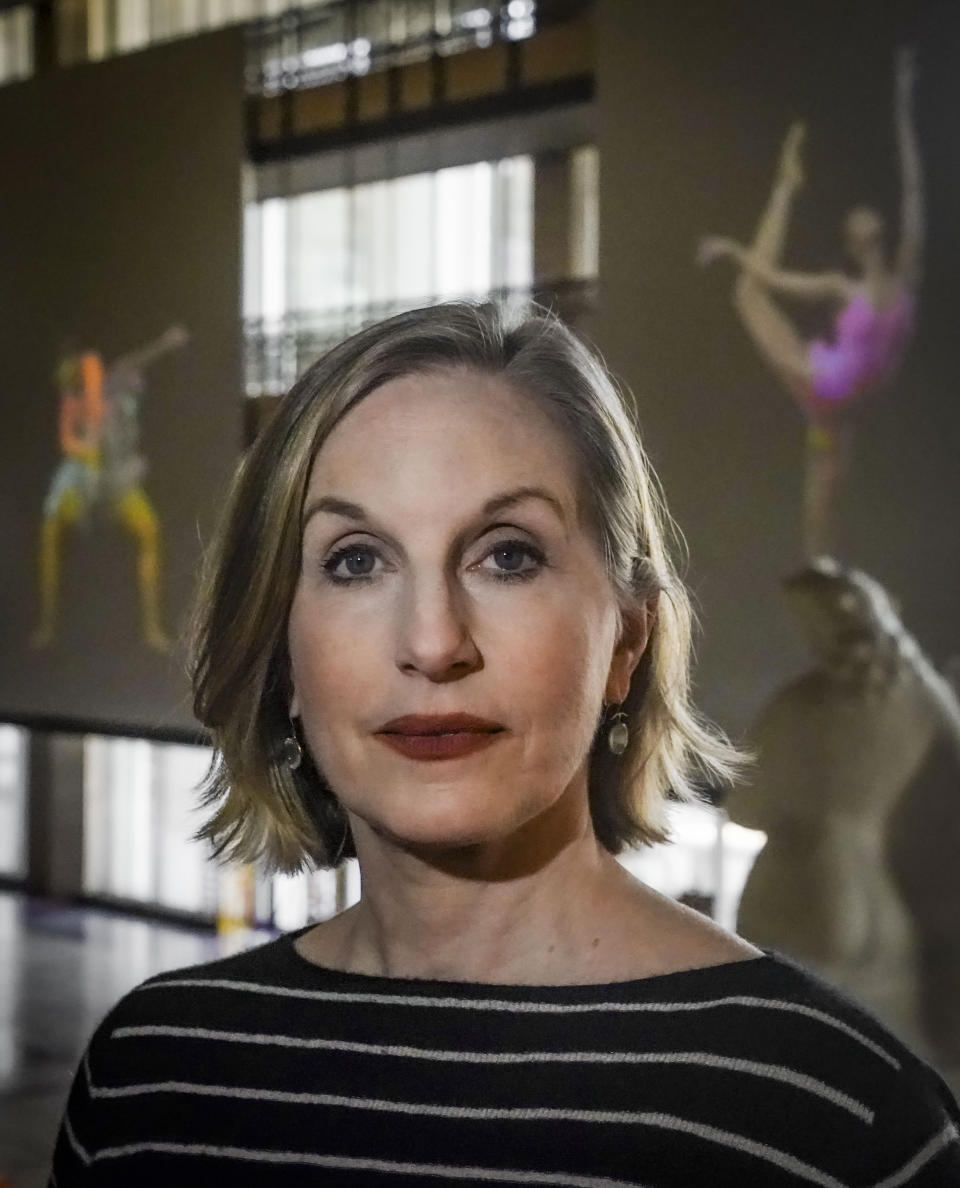 New York City Ballet's associate artistic director Wendy Whelan poses inside the lobby of the David H. Koch Theater at Lincoln Center, Thursday, Feb. 29, 2024, in New York. (AP Photo/Bebeto Matthews)