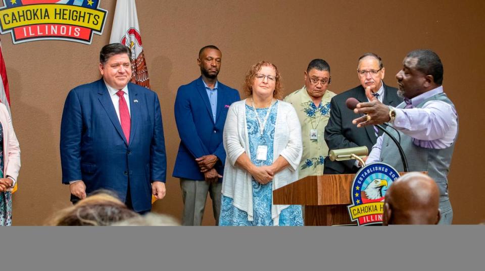 Illinois Governor JB Pritzker listens as Cahokia Heights mayor Curtis McCall Sr. thanks him for the nearly $9.9 million grant that is part of more than $21 million in state funding earmarked for improving infrastructure in Cahokia Heights.