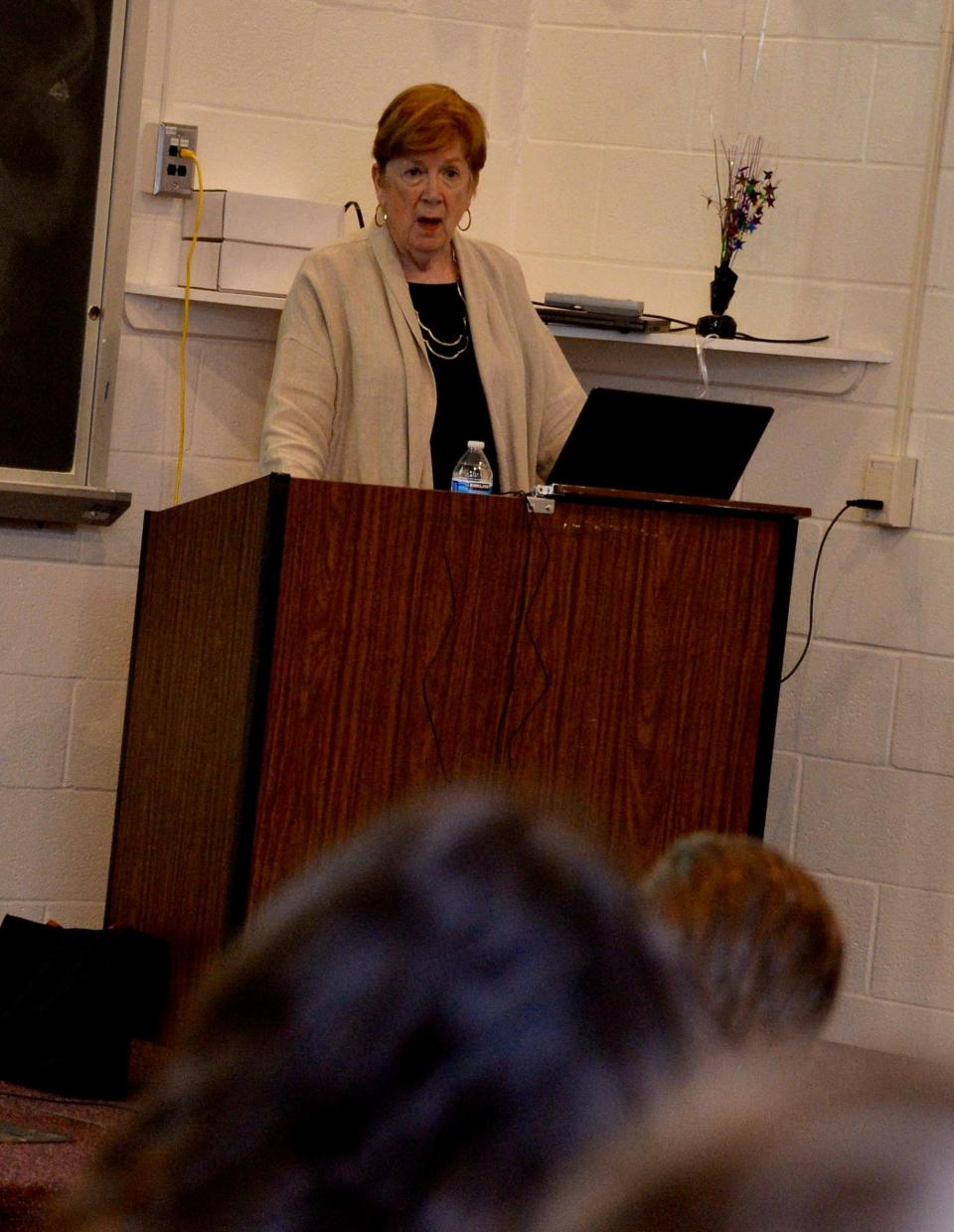 Jonna Mendez, a former chief of disguise for the CIA, shares stories from her CIA days with a group at the Boyd J. Michael III Technical High School on Thursday that included cybersecurity, artificial intelligence and homeland security students.