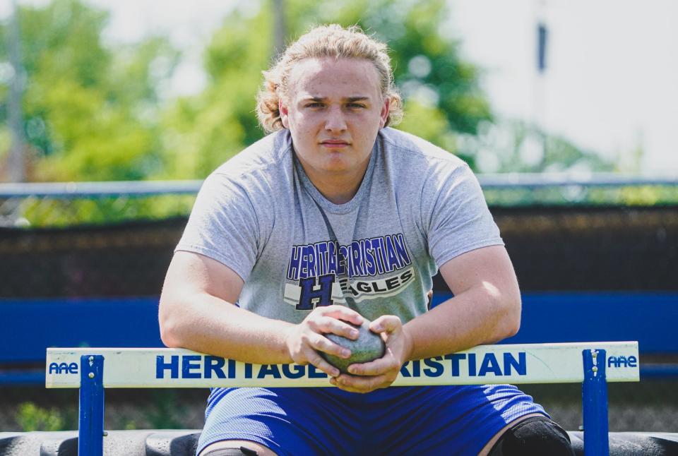 Luke Himes is photographed during track and field practice on Monday, May 22, 2023, at Heritage Christian High School in Indianapolis. Himes competes in  shot put and discus.