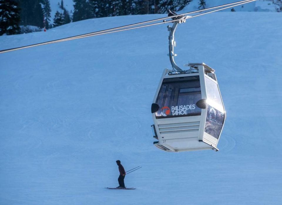 A skier finishes a run near the gondola at Palisades Tahoe in Placer County on Thursday, Jan. 11, 2024, the day after a skier died after an avalanche on a nearby run at the resort.