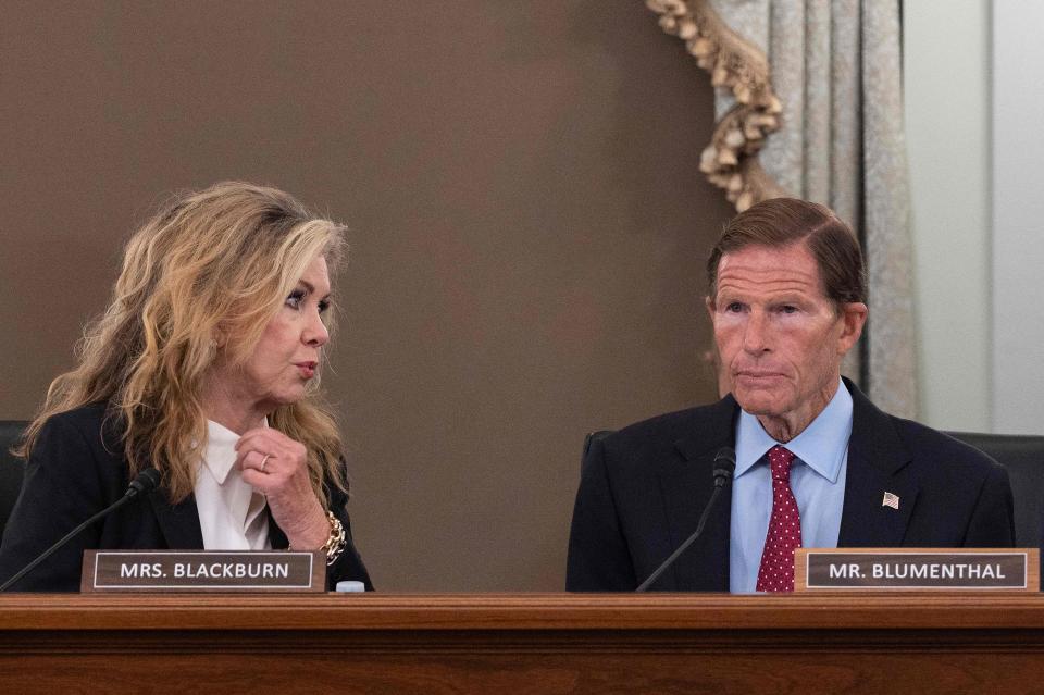 Sen. Marsha Blackburn speaks with Sen. Richard Blumenthal as former Facebook employee and whistleblower Frances Haugen testifies before a Senate committee hearing on Capitol Hill on Oct. 5.