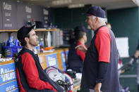 Cleveland Guardians pitching coach Carl Willis, right, talks to starting pitcher Shane Bieber after Bieber completed the eighth inning of a baseball game against the Detroit Tigers, Saturday, May 28, 2022, in Detroit. (AP Photo/Carlos Osorio)