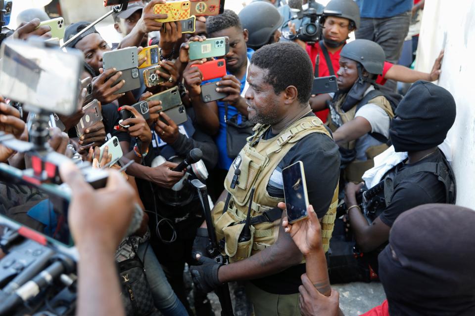 Barbecue, the leader of the "G9 and Family" gang speaks to journalists in Port-au-Prince, Haiti, Gangs control the country, leaving the world to grapple with that nation's crisis.