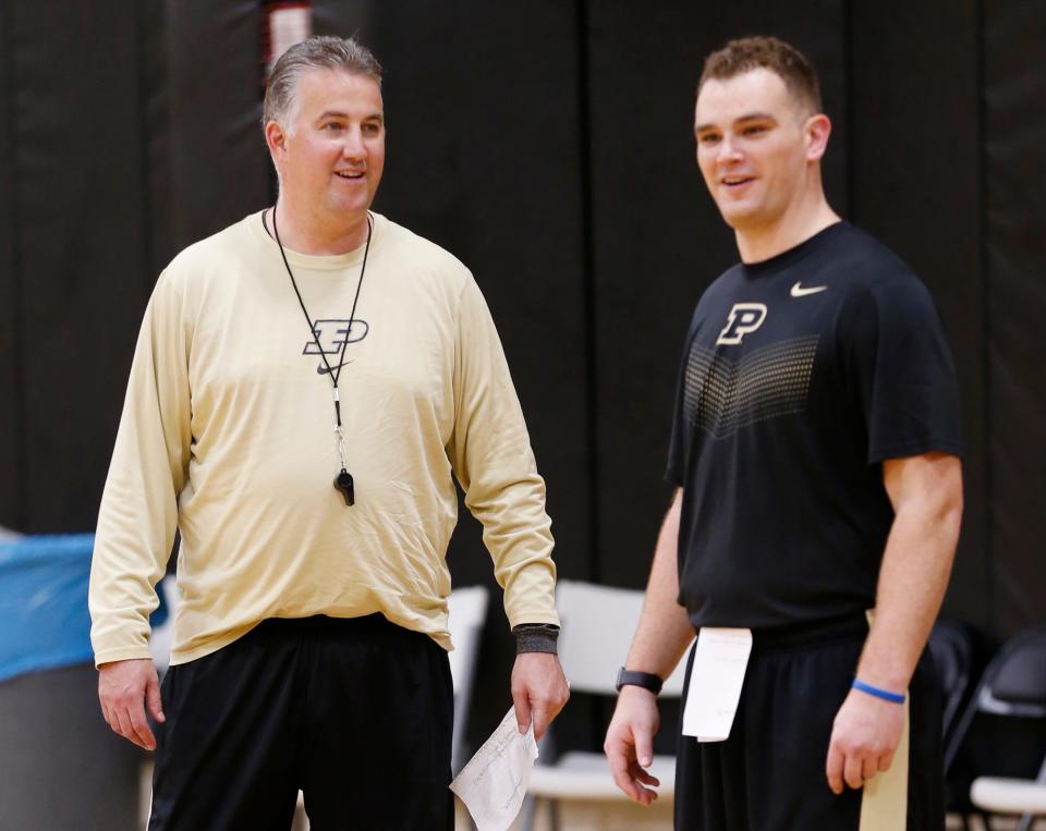 Head coach Matt Painter shares a laugh with graduate assistant D.J. Byrd during Purdue basketball practice Wednesday, June 14, 2017, at Cardinal Court in Mackey Arena.