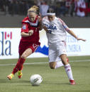 VANCOUVER, CANADA - JANUARY 21: Brittany Timko #17 of Canada battles with Maria Perez #13 of Cuba for the loose ball during the second half of the 2012 CONCACAF Women's Olympic Qualifying Tournament at BC Place on January 21, 2012 in Vancouver, British Columbia, Canada. (Photo by Rich Lam/Getty Images)