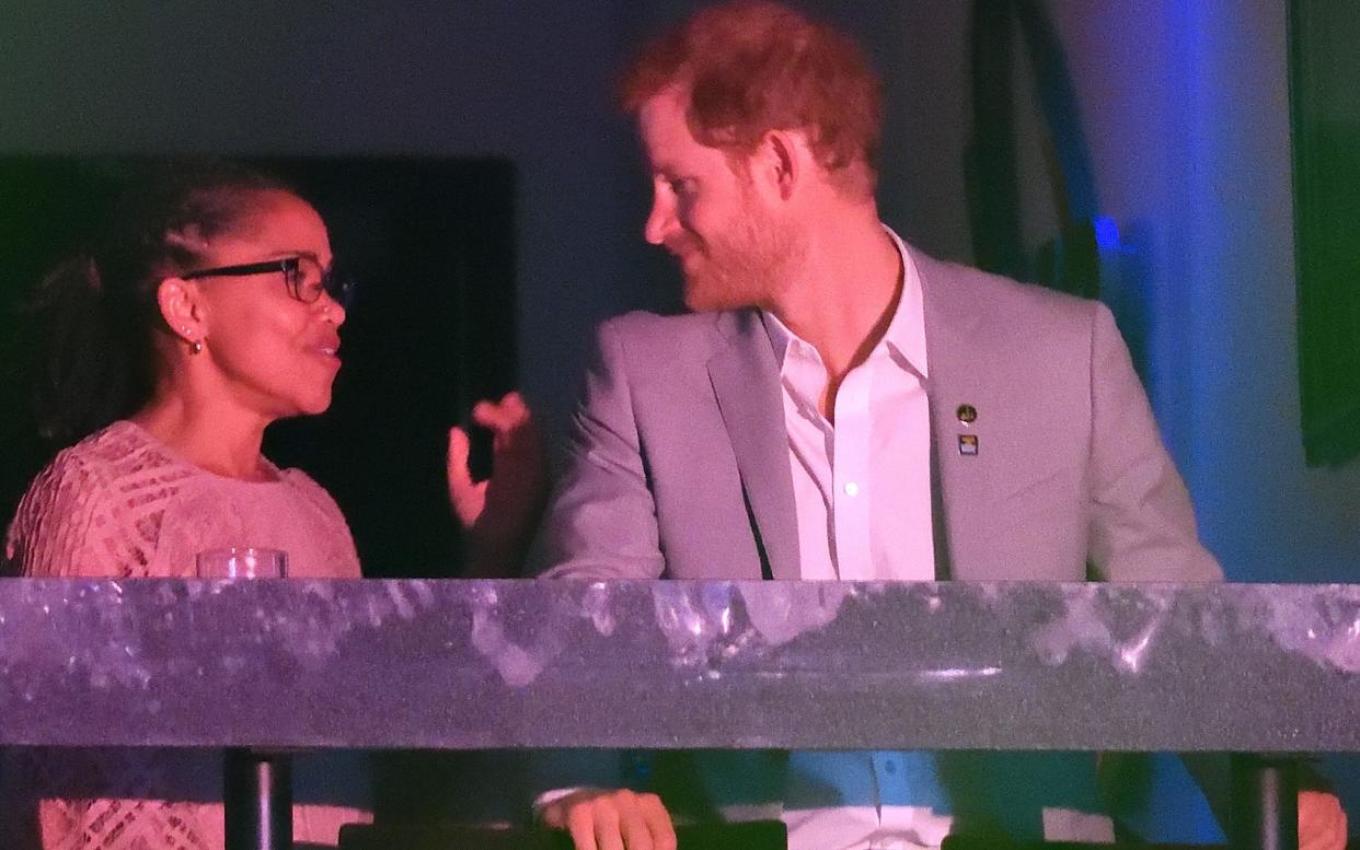 Prince Harry with Meghan Markle's mother, Doria Ragland, at The Invictus Games in Canada in September - The Mega Agency