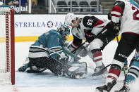 San Jose Sharks goaltender Alexei Melnichuk (1) guards against a shot by Arizona Coyotes center Lane Pederson (93) during the second period of an NHL hockey game in San Jose, Calif., Saturday, May 8, 2021. (AP Photo/John Hefti)