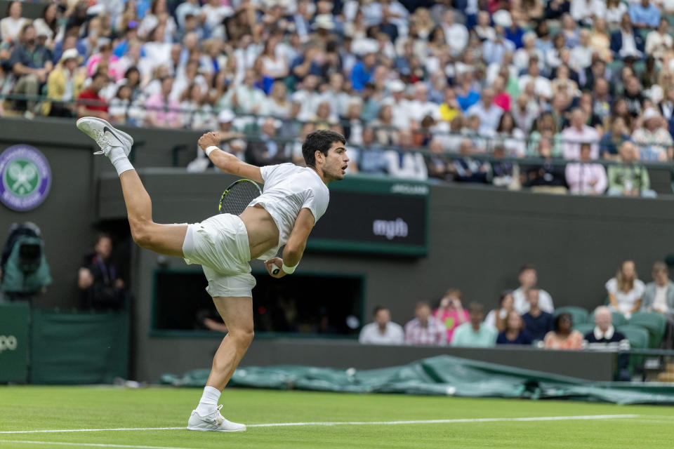 Carlos Alcaraz cruised past Jeremy Chardy in the first round of Wimbledon at the All England Lawn Tennis and Croquet Club on Tuesday in London. (Photo by Tim Clayton/Corbis via Getty Images)