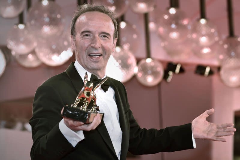 Roberto Benigni receives the Golden Lion for lifetime achievement during the opening ceremony of the 78th Venice International Film Festival on September 1, 2021, in Italy. The actor turns 71 on October 27. File Photo by Rocco Spaziani/UPI